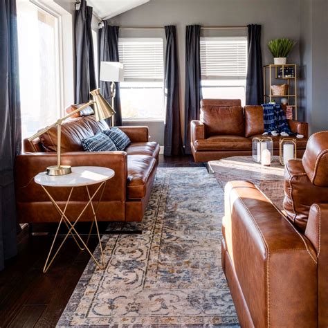 Mid century living room , Carmel leather couches dark gray curtains