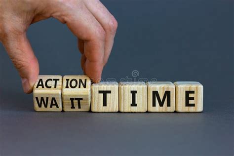 Action Or Wait Time Symbol Businessman Turns Wooden Cubes And Changes
