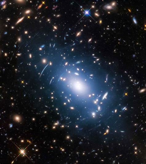 Faint Starlight In Hubble Images Reveals Distribution Of Dark Matter