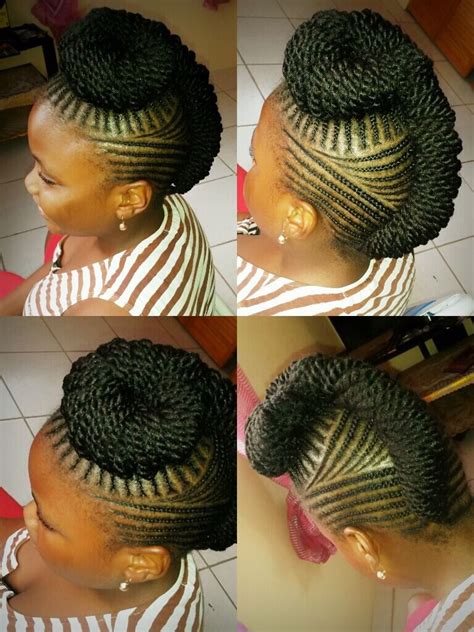 This stunning updo gives a whole new twist to afro hairstyles. Natural braiding done by Jalicia - St Kitts | Hair styles ...