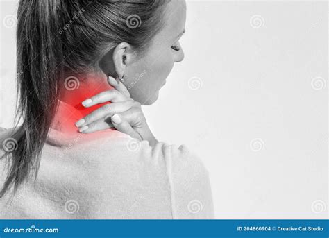 Woman Suffering From Neck Pain And Injury Female Massaging Her Neck Stock Photo Image Of