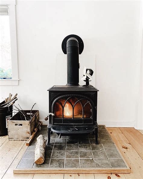 Make your outdoor vision a reality. Simple hearth around simple wood burning stove. Perfect ...