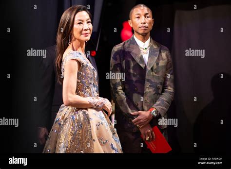 Presenters Michelle Yeoh And Pharrell Williams Backstage During The