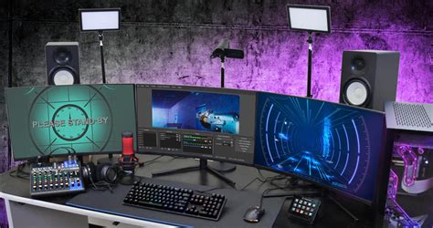 Streaming Studio Setup With Three Monitor Lights Speakers Mic