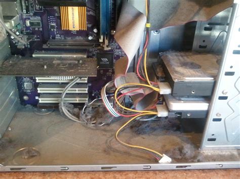 After disconnecting the fan from the computer, hold the fins of the fan in place using your fingers. Death By Dust | Tech Club