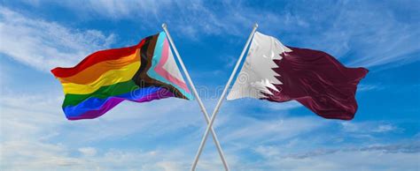 Crossed Flags Of Progress Lgbt Pride And Qatar Flag Waving In The Wind At Cloudy Sky Freedom