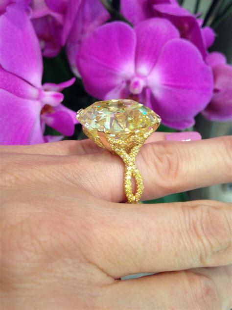 trying on at david morris london bond street a 41 35 carat yellow diamond ring engagement ring