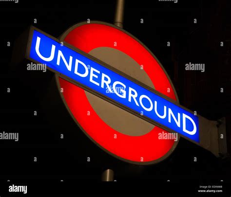 London Underground Sign At Night Stock Photo Alamy
