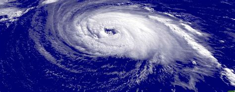 Tropical cyclone, an intense circular storm that originates over warm tropical oceans and is characterized by low atmospheric pressure, high winds the wind field of a tropical cyclone may be divided into three regions. What is the difference between a hurricane and a typhoon?