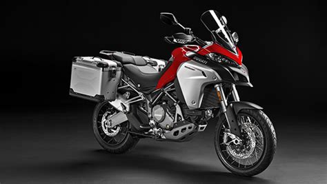 Triumph tiger 800xc middleweight adventure comparison test in the land of the midnight sun. Spec comparison: BMW R 1200 GS vs BMW R 1200 GSA vs Ducati ...