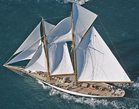 An Aerial View Of A Sailboat In The Ocean