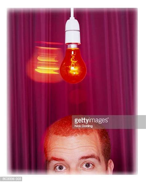 Light Bulb Above Head Photos And Premium High Res Pictures Getty Images