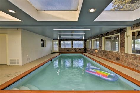 This 4000 sq ft property is situated on 2 full private acres with a huge creek directly behind it. Modern Albuquerque House w/ Private Indoor Pool! UPDATED ...