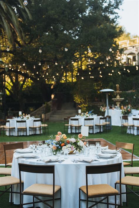 Romantic Outdoor Wedding Reception With Round Tables At The Houdini