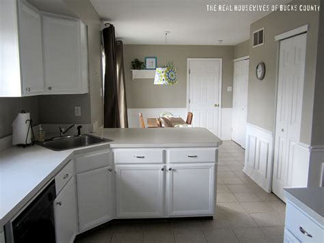 The cabinet provides beauty and function. How to Paint Cabinets White | East Coast Creative