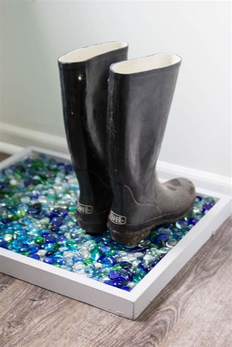 So this diy shoe rack, isn't really a shoe rack, but it is a boot tray, which holds shoes! Easy and Functional DIY Boot Tray | Stacie's Spaces