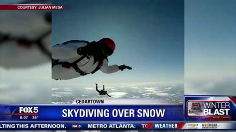 Skydiving Over Snow Youtube