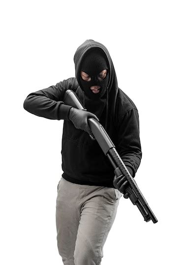 Premium Photo Criminal Man In Hidden Mask Pointing The Shotgun