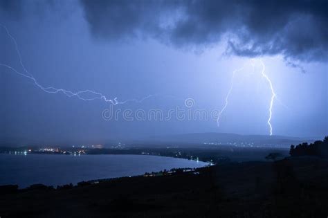 Amazing Lightning Strike Over Lake Stock Photo Image Of Dark Strike