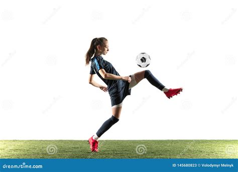 female soccer player kicking ball isolated over white background stock image image of jumping
