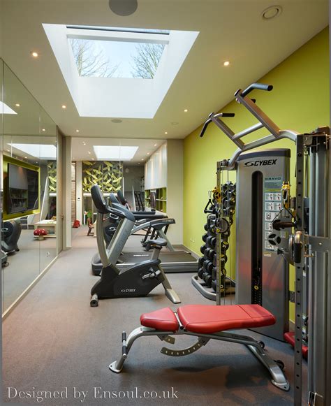 A Beautiful Home Gym In A Basement With Great Natural Light From A