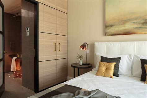 Open plan bedroom and bathroom designs. Storage space as separating idea | Bedroom design ...