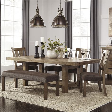 Signature Design By Ashley 9 Piece Dining Set And Reviews Wayfair