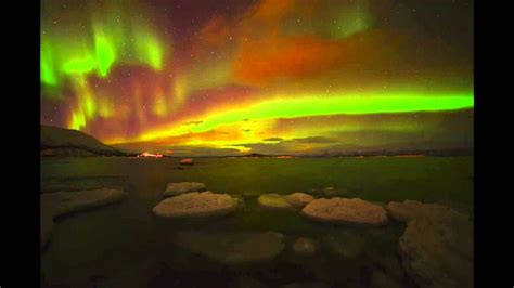 Red And Green Christmas Auroras Light Up Skies Over Sweden Video