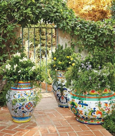 The Front Cover Of Garden Chic Magazine Featuring Colorful Pots With