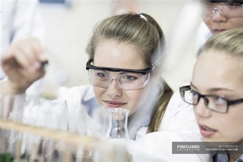 Students In Chemistry Class Pipetting Liquid Into Test Tube — Safety