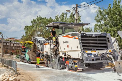 eco friendly road rehabilitation with cold recycling train in portugal lectura press