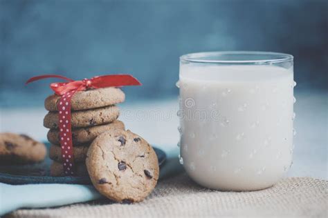 Stack Of Chocolate Chip Cookie And Glass Of Milk Stock Image Image Of Blue Natural 141335327