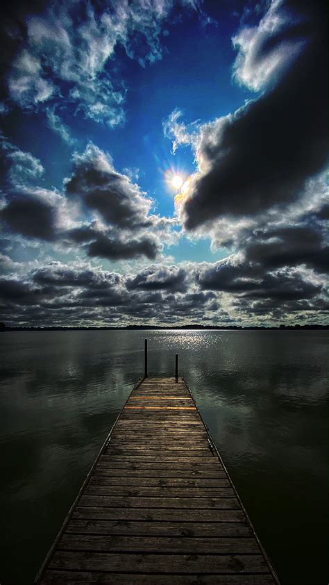 Solidarity Clouds Lake Piers Sky Sun Hd Phone Wallpaper Peakpx