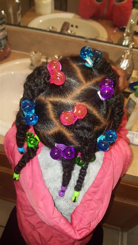 It's true that they can damage the hair. Colorful hairstyle for little, black girls. Braids, Beads, and rubber bands in natural hair ...