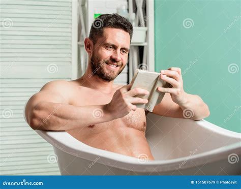 Man In Bathroom Reading Macho Naked In Bathtub Sex And Relaxation