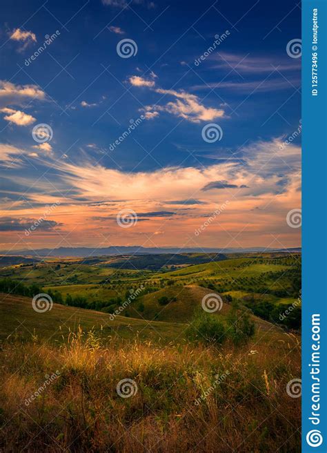 Beautiful View Over The Picturesque Hills With A Sky Full With B Stock