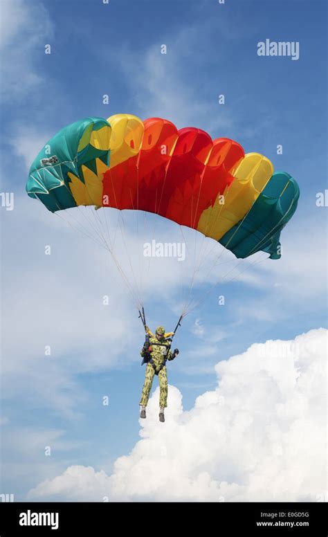 One Day With Parachutist In Airfield The Skydiver Landing Under Green