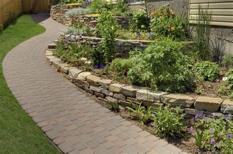 A Terraced Planting Bed Allows You To Incorporate Stone And Separate