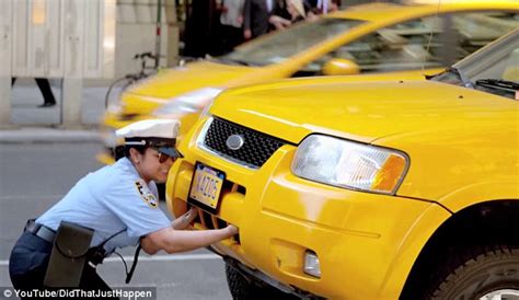 Meter Maid Jenni Ruiza Lifts Taxi Cab In Front Of New Yorkers In