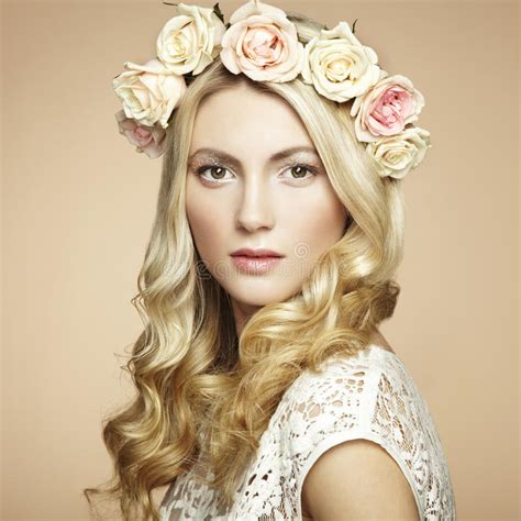 Blond hair in males does not correlate with oestrogen levels as it does in females and blond hair in males is not a known indicator. Portrait Of A Beautiful Blonde Woman With Flowers In Her ...