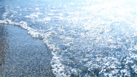 Closeup Image Of Calm Blue Sea Waves Rolling On Sandy Beach Stock Image