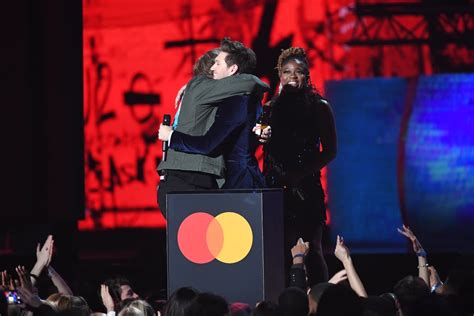 Lewis Capaldi Hugging Niall Horan On Stage At The 2020 Brit Awards