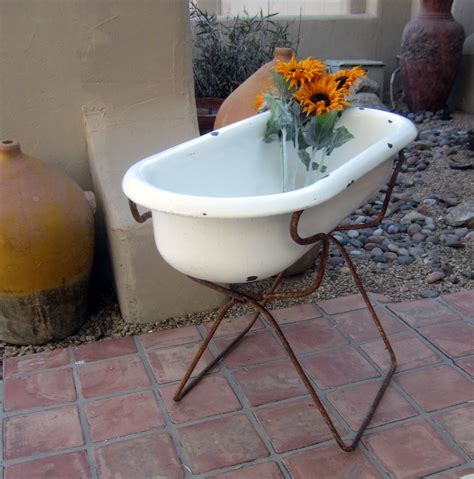 Find the right tub to get the job done. authentic ANTIQUE baby BATHTUB tub folding stand from Hungary