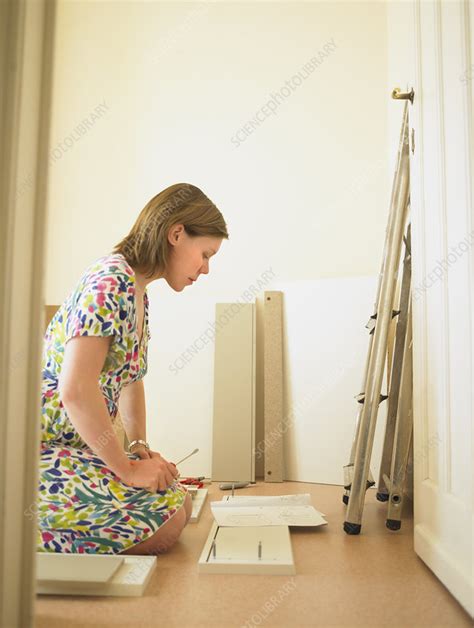 Woman Building Chest Of Drawers Stock Image F0038250 Science