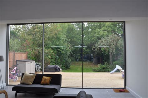 Slim Sightlines Maximises The Views Modern Patio Doors Minimal