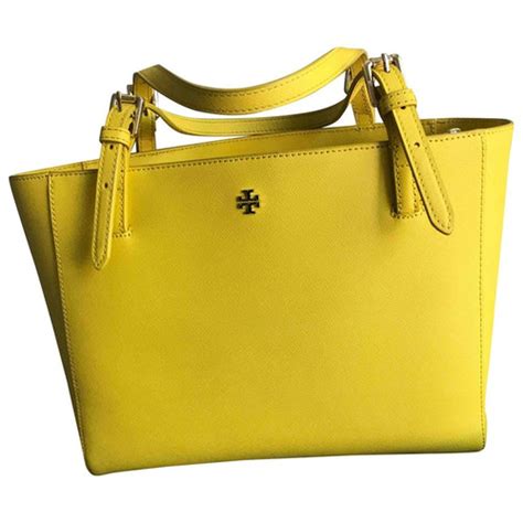 Check out our tory burch selection for the very best in unique or custom, handmade pieces from our stud earrings shops. Pre-Owned Tory Burch Yellow Leather Handbag | ModeSens
