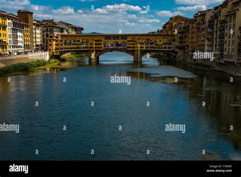 A View Down The Arno River In Florence To The Famous Ponte Vecchio