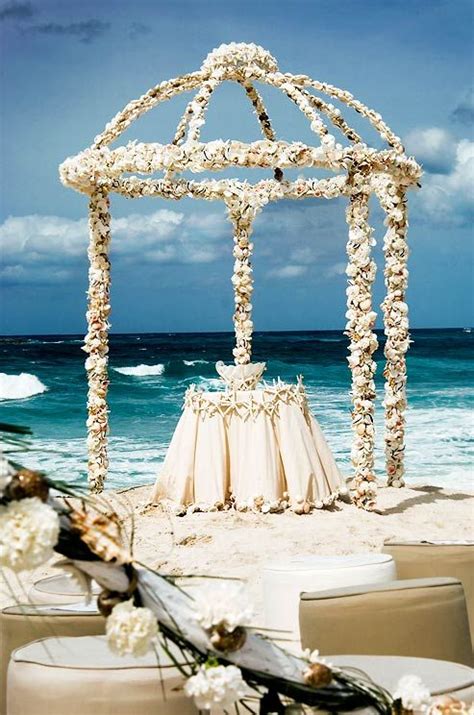 We've outlined the most common ceremony traditions here. Chic Beach Wedding Ceremony Ideas - MODwedding