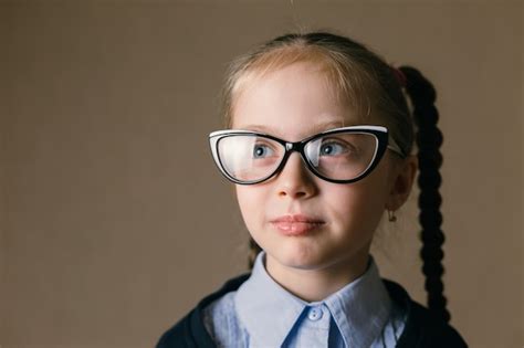 Premium Photo Little Girl Wearing Glasses