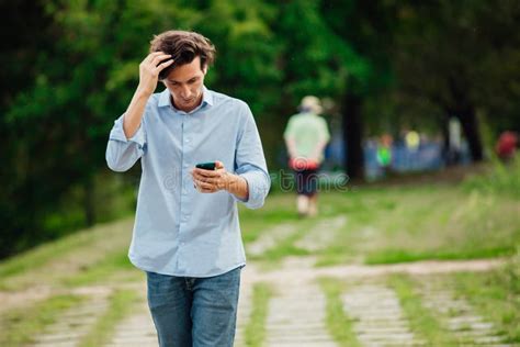 Young Adult Walking Alone In Park Stock Image Image Of Happy